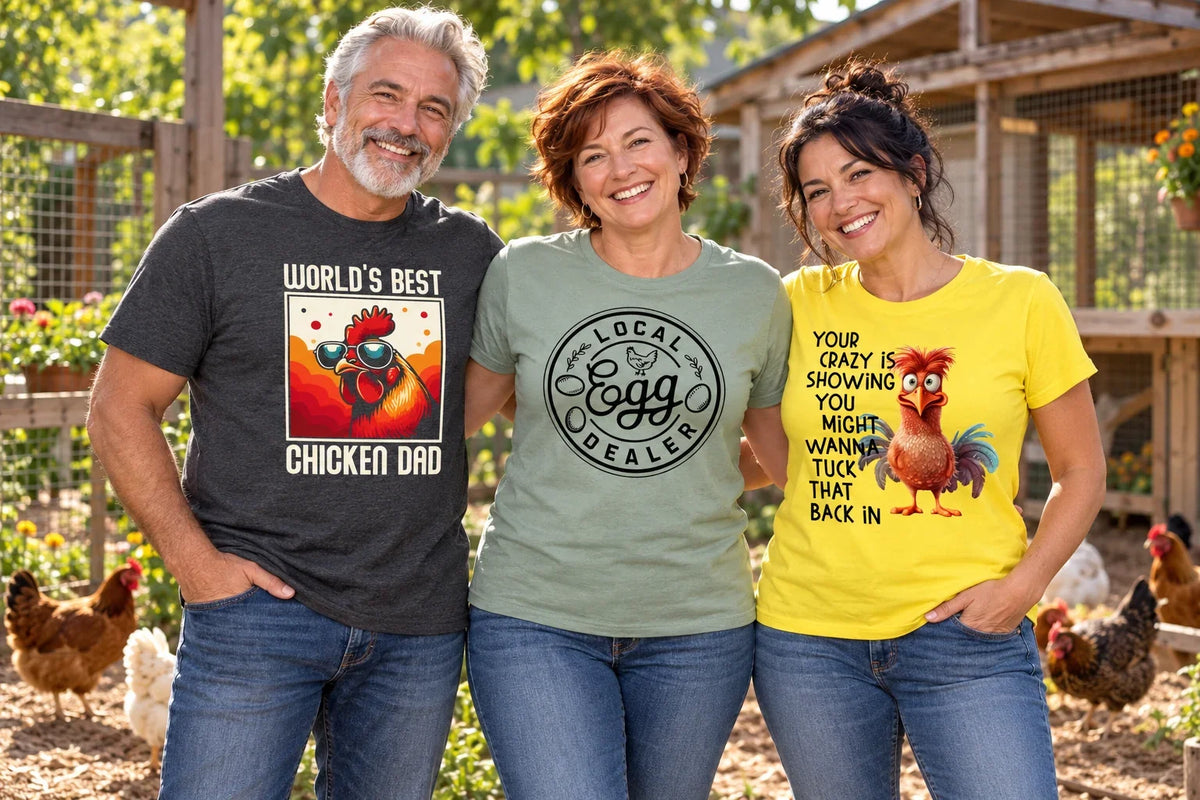Three adults wearing Backyard Chickens shirts with Chicken Dad, Local Egg Dealer, and funny chicken designs beside a garden coop.