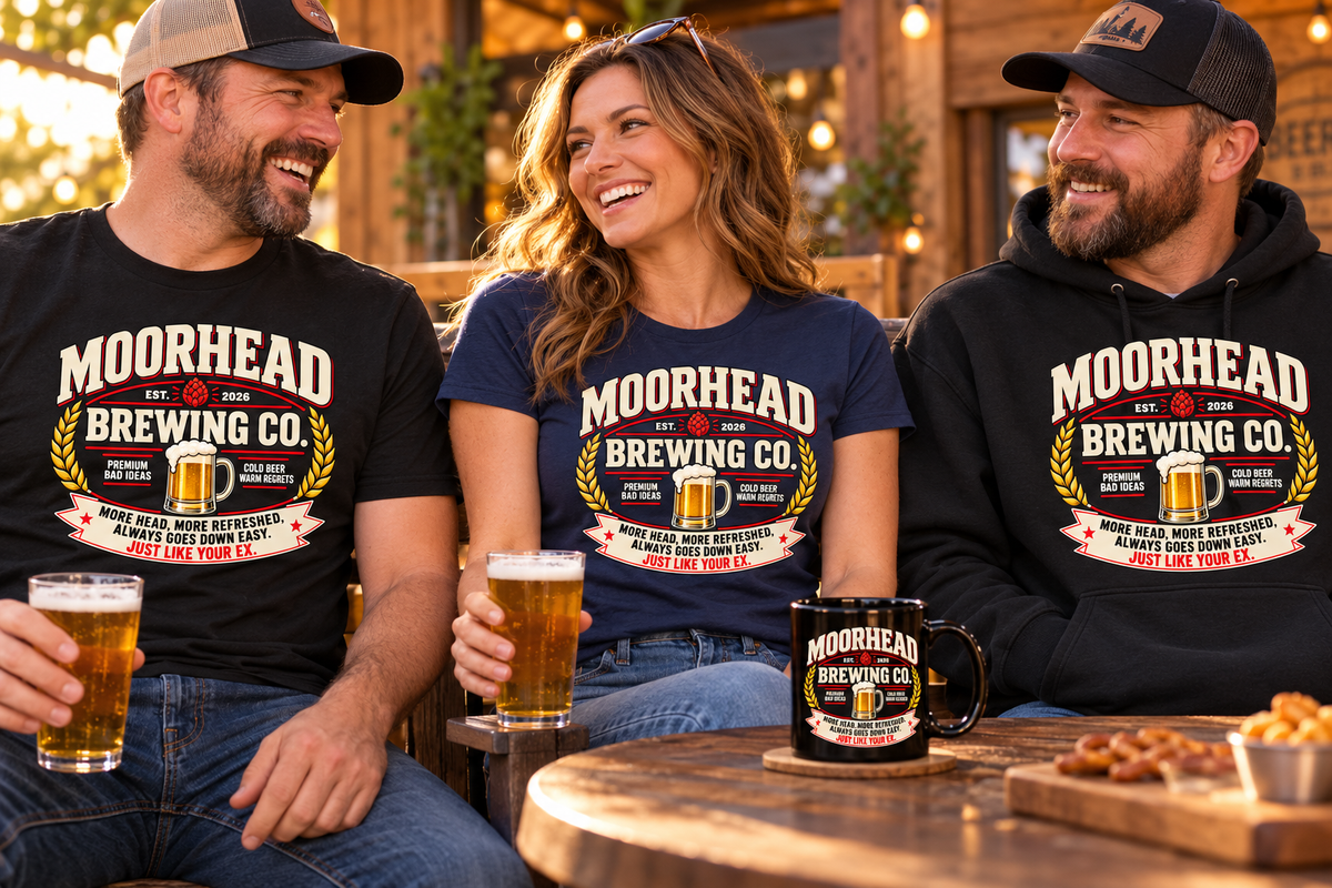Adults wearing Moorhead Brewing Co. beer-crest men’s and women’s T-shirts and a hoodie on a pub patio.